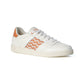 Vegane Low-Top-Sneaker mit aprikosenfarbenem Webmuster und atmungsaktivem Innenfutter – stilvoll und umweltfreundlich.